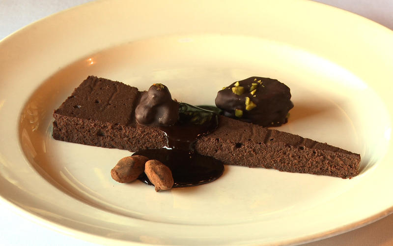 Bittersweet chocolate cake with hot fudge sauce and cioccolati perugini