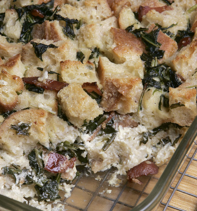 Bread pudding with dandelion greens and bacon