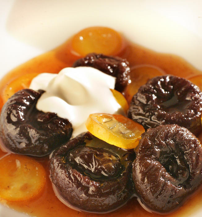 Earl Grey tea-poached prunes with glazed kumquats