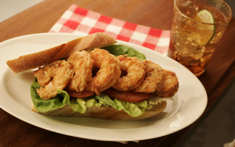 Fried shrimp sandwich with lettuce and tomato
