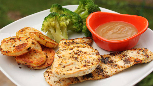 Grilled Chicken, Potatoes and Broccoli with Cheese and Gravy Sauces