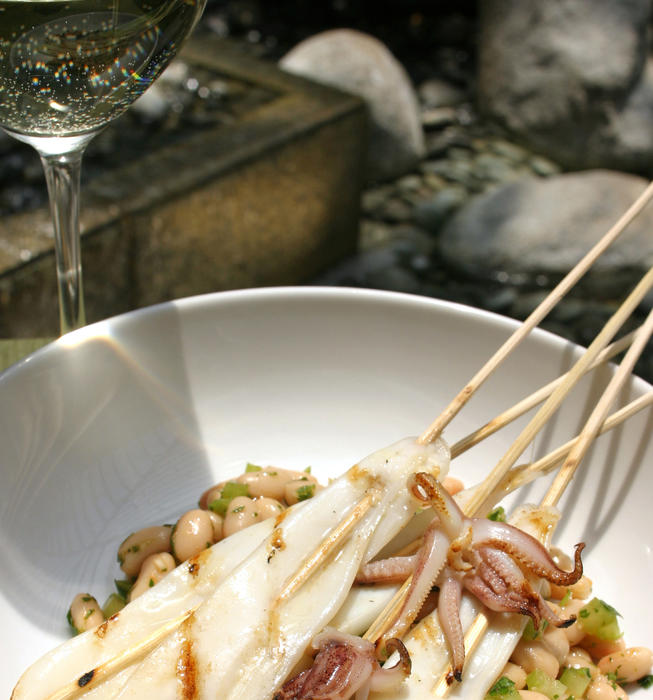 Grilled squid with white bean salad