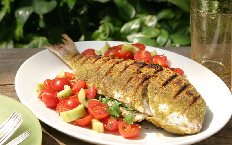 Grilled whole snapper with tomato-cucumber salad