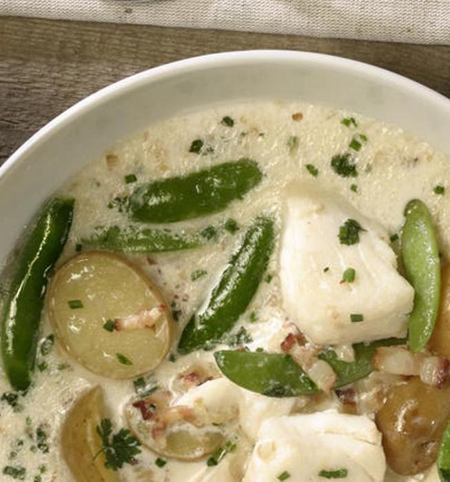 Halibut chowder with spring herbs and sugar snap peas
