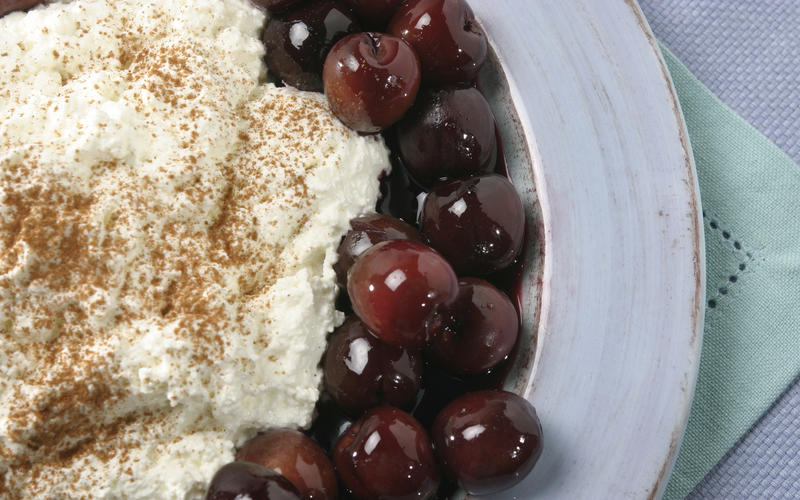Homemade ricotta with red wine-poached cherries