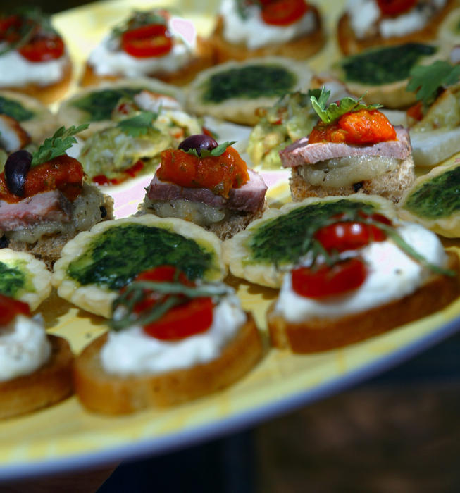 Miniature caprese salads on toasted baguette