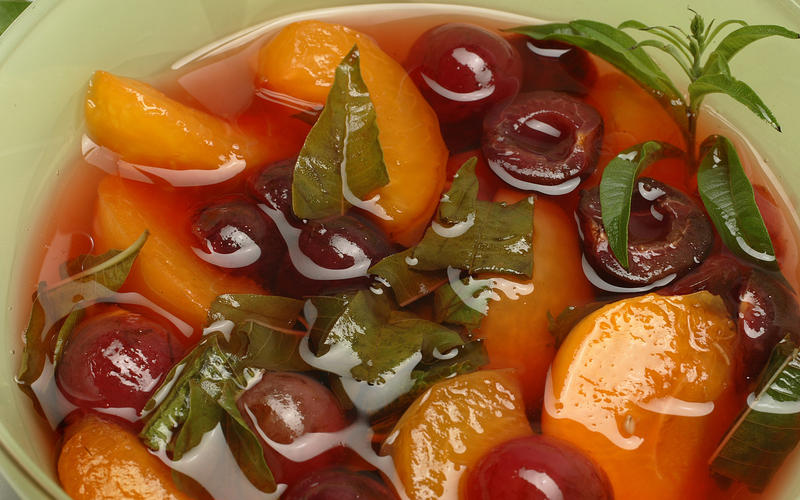Poached fruit in lemon verbena syrup