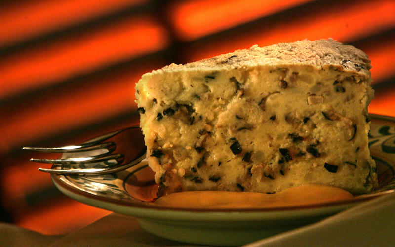 Potato timballo with fonduta (cheese sauce)