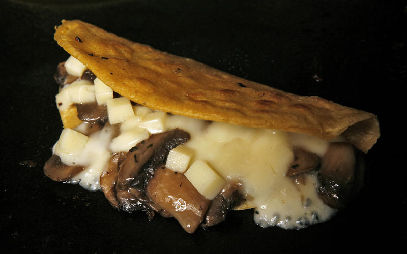 Quesadillas stuffed with mushrooms and goat cheese