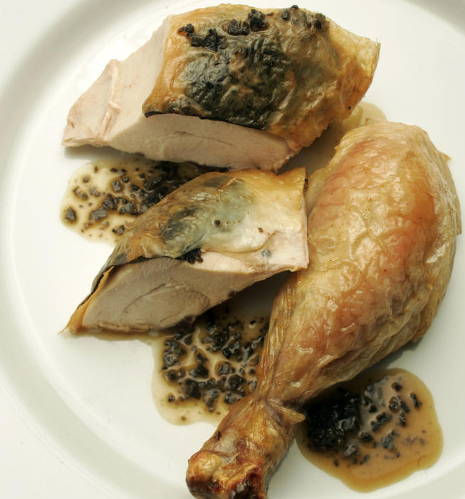 Roast chicken with truffles and truffle butter