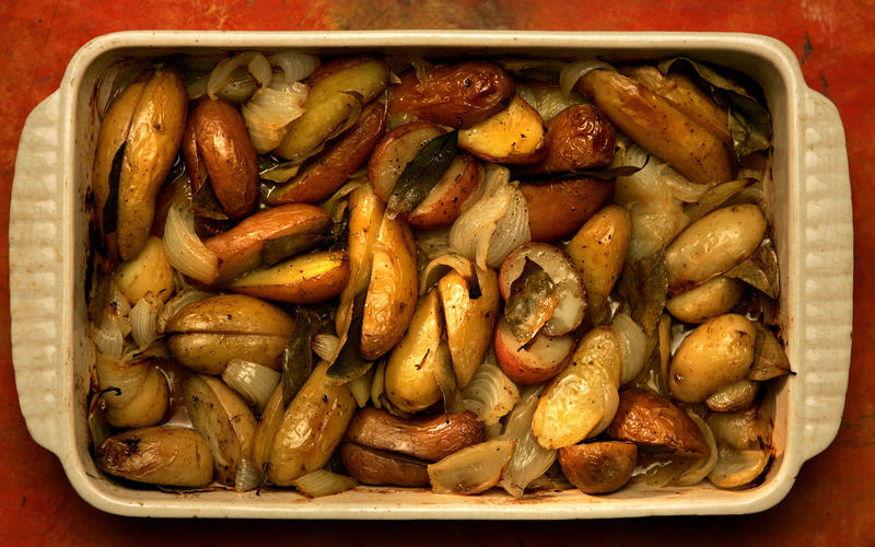Roast potatoes, onions, fennel and bay leaves