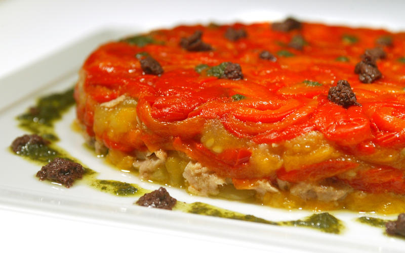 Roasted pepper, tomato and tuna mold with basil and black olive purees