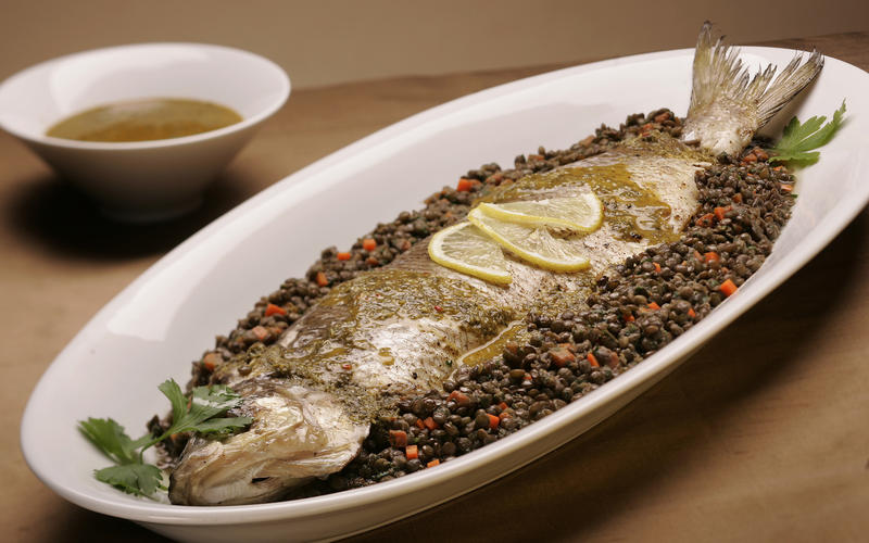 Roasted whole whitefish with charmoula and French green lentils