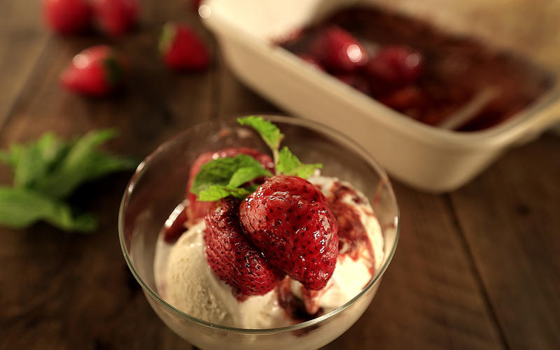 Roasted winter strawberries with ice cream