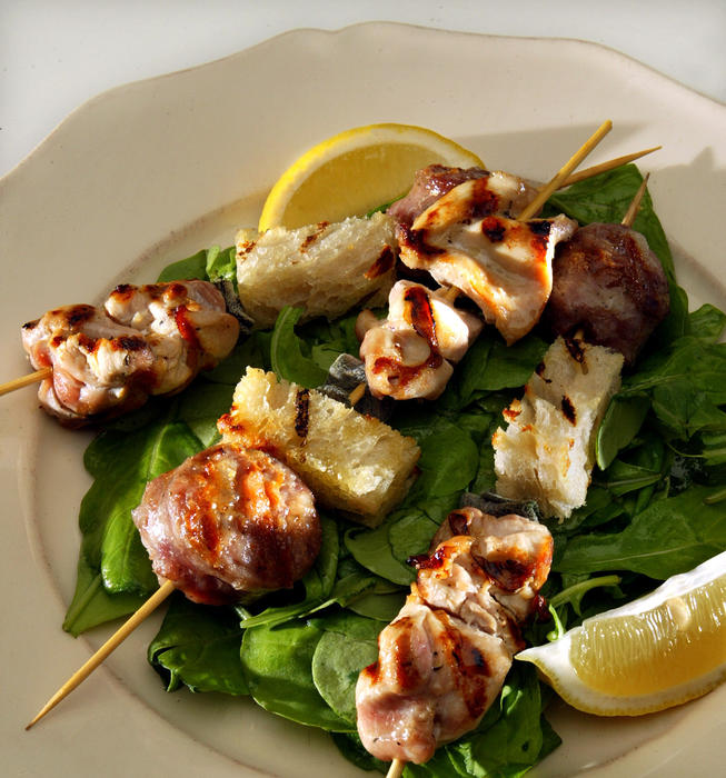 Sausage, chicken and bread skewers