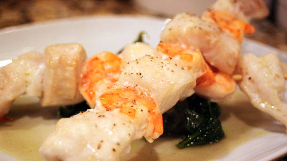 Seafood Skewers on a Bed of Chili-Garlic Spinach