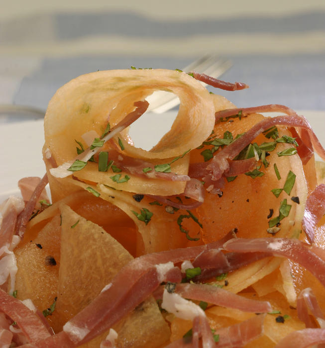 Shaved cantaloupe with prosciutto and mint