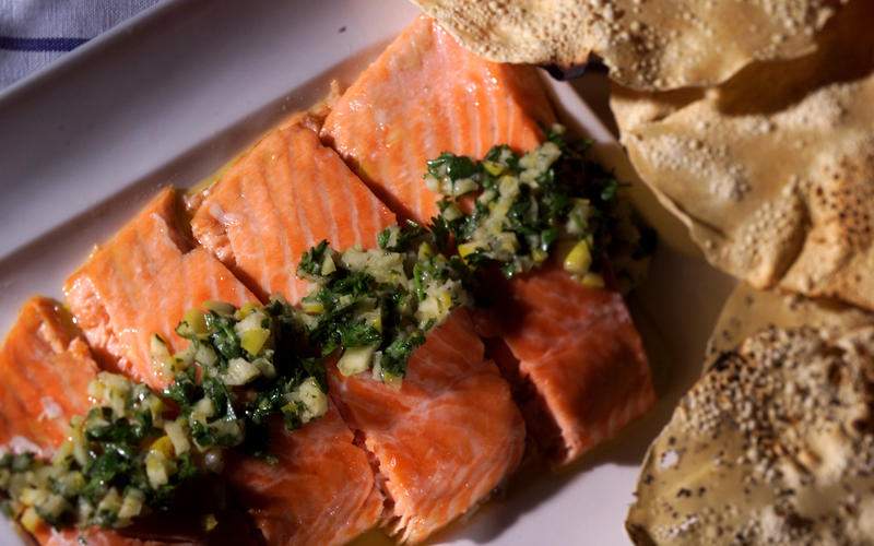Slow-baked salmon filet with preserved lemon and herb relish