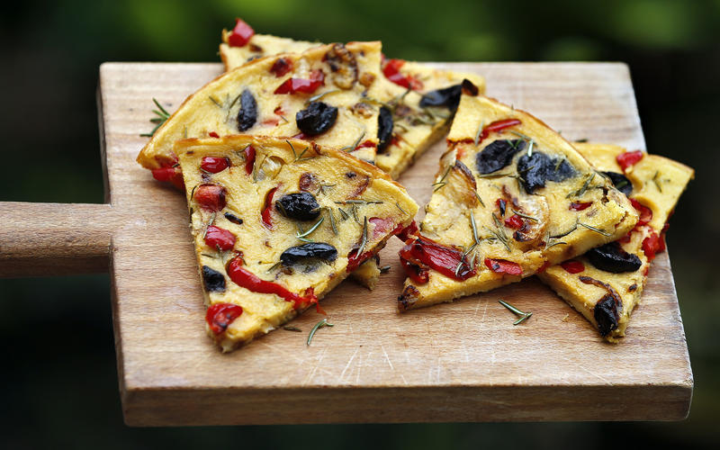 Socca with peppers, fennel and olives