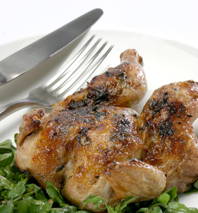 Spring chicken with ramps on a bed of watercress