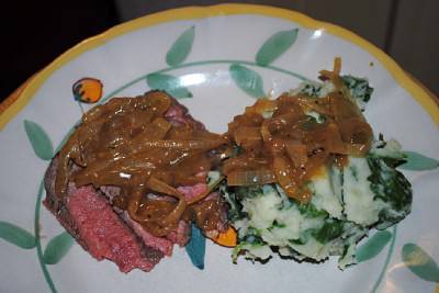 Steak Out: Drunken Onion Gravy over Sliced Steak with Mashed Potatoes and Spinach