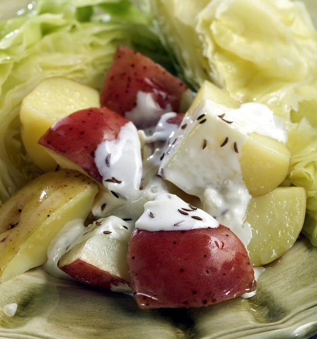 Steamed potatoes with cabbage