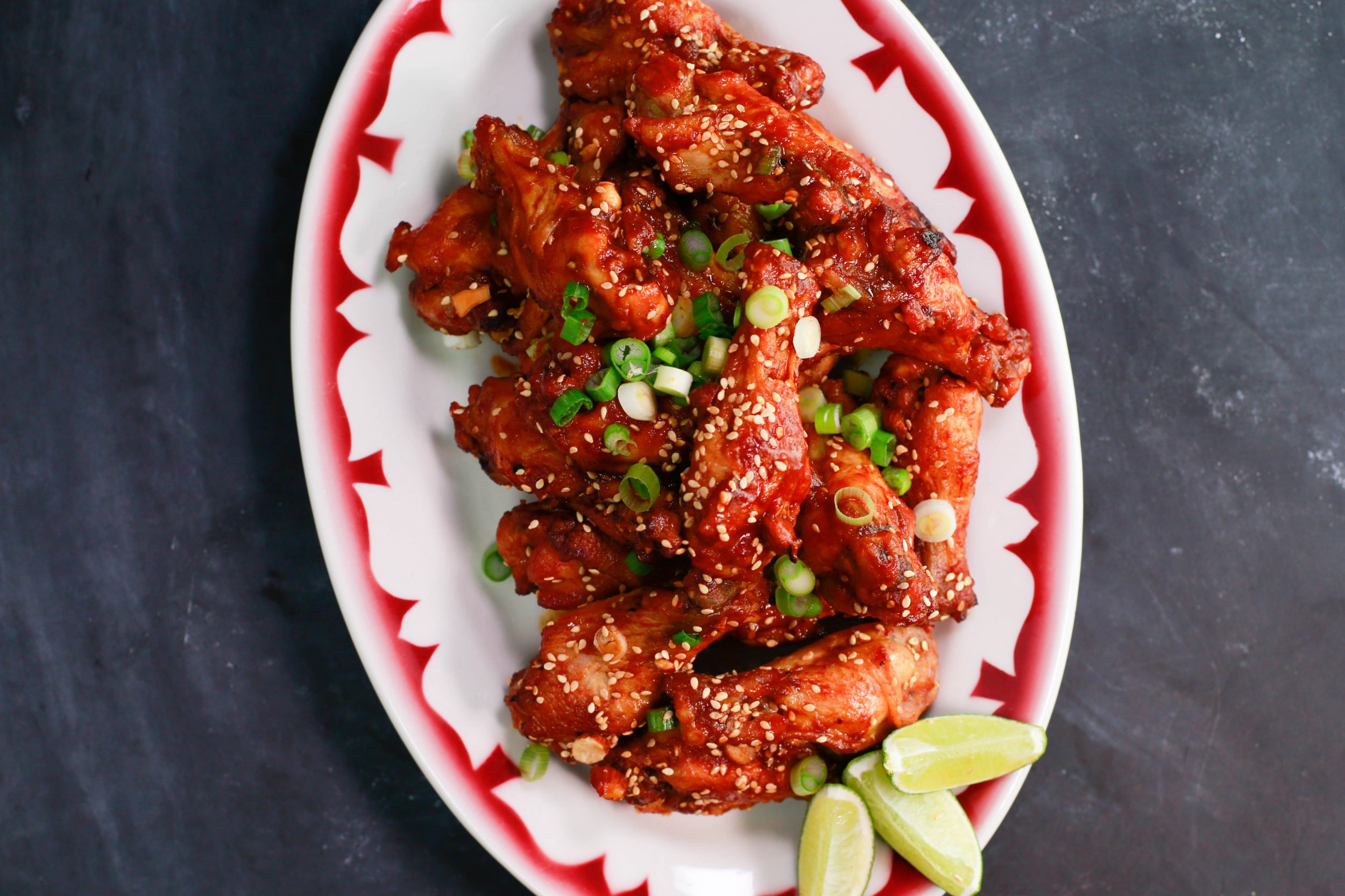 Super Sriracha Wings with Pickled Carrots & Celery Sticks & Fixins Bar
