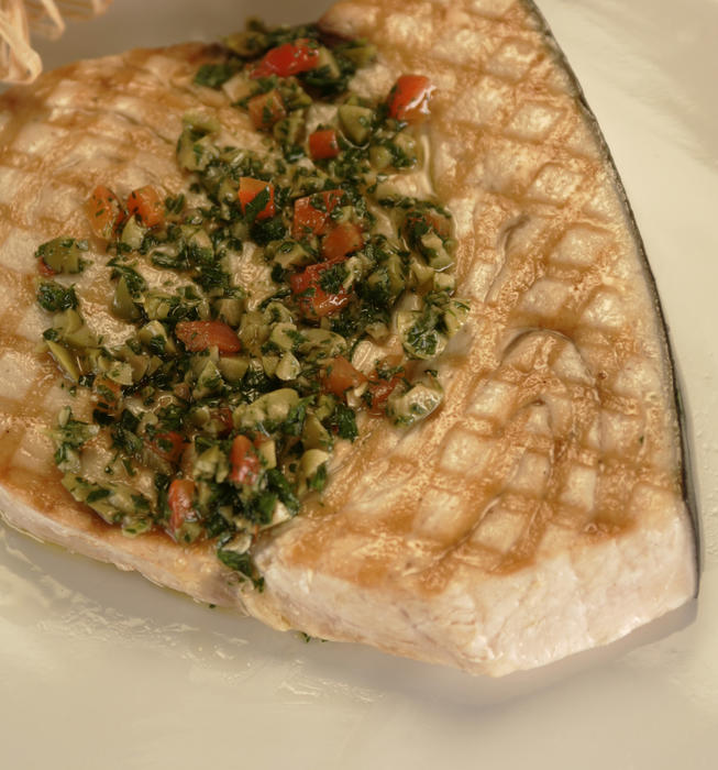 Swordfish with green olive salsa