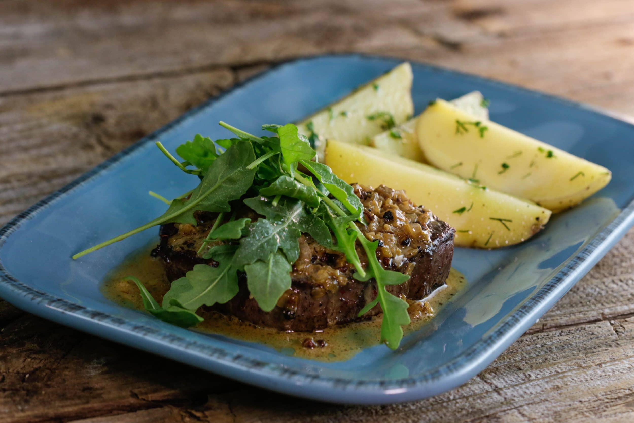 Three-Peppercorn Steaks with Herb Potatoes