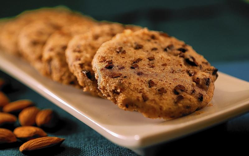 Vegan almond sable cookies with cacao nibs 