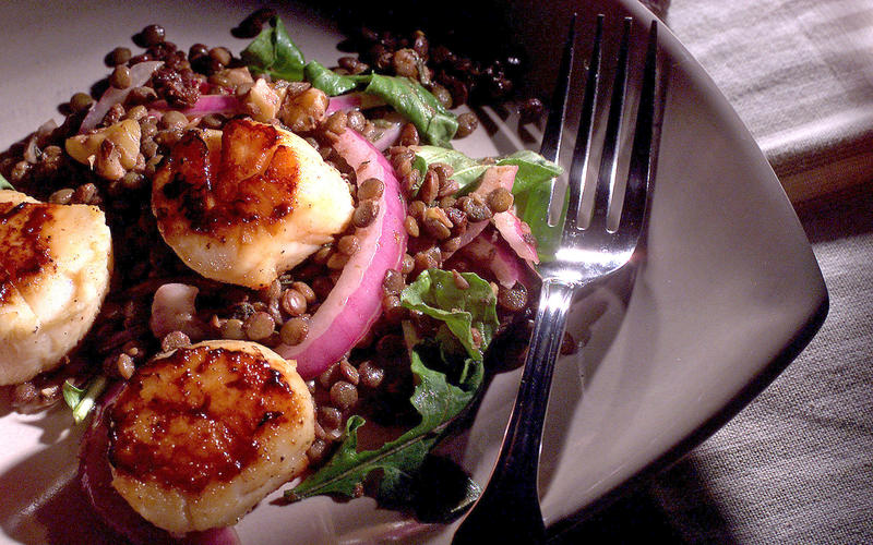 Warm lentil salad with seared scallops
