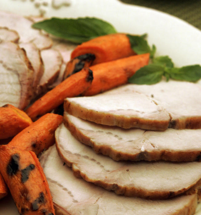 Winter roast pork with basil pomegranate sauce