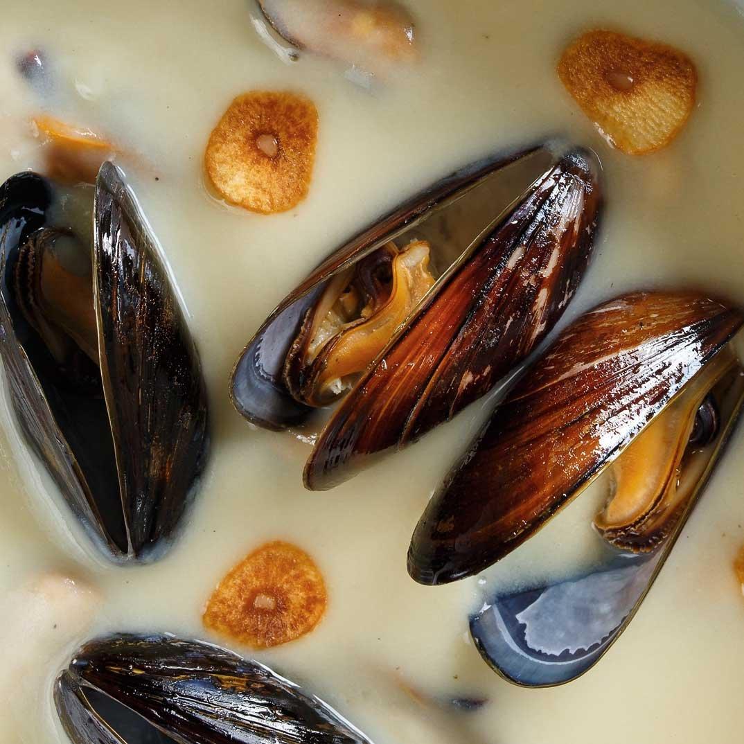 Cream of Potato Soup with Roasted Garlic and Mussels