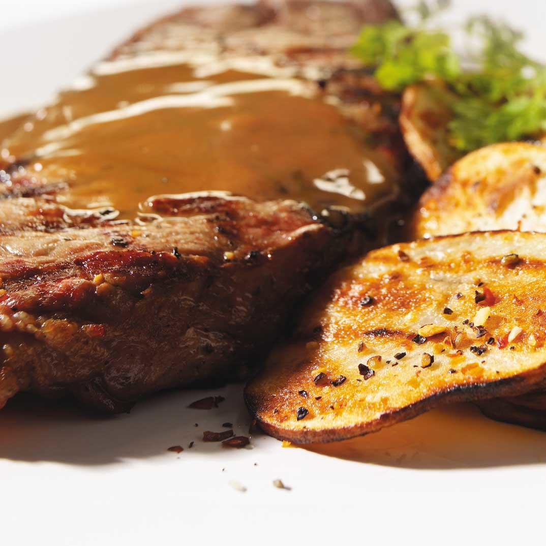 Strip Loin Steaks with Creamy Brown Butter and Balsamic Sauce